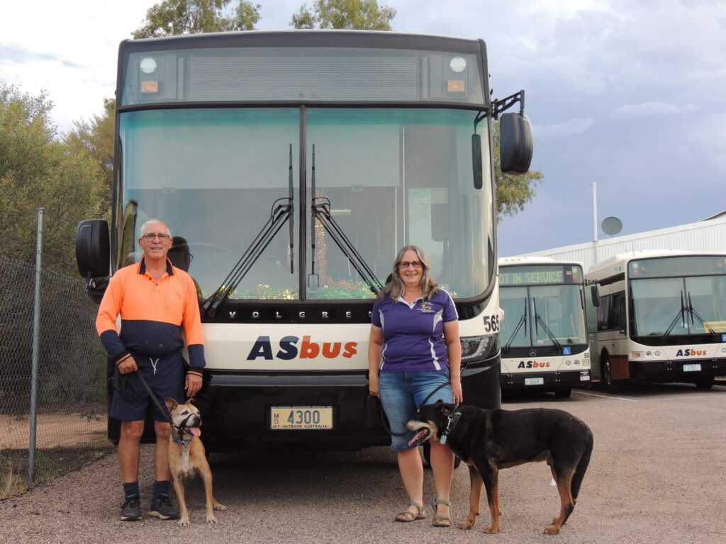 Poppy And Greg Searle infront of CDCs Alice Springs Depot
